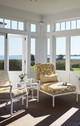 Custom Outdoor Printed Performance Crochet seat cushion by Raoul Dufy, paired with Belfour fabric, located at Finolhu. Photographed by Thomas Fatin.